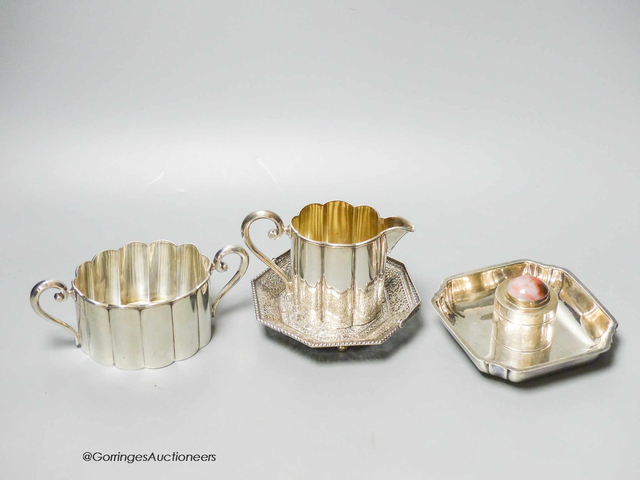 A collection of assorted silver to include a Persian pierced white metal dish, an 800 standard jug and bowl, an agate topped box, a small 925 sterling standard dish.